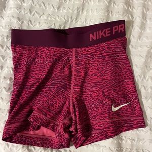 Pink leopard print Nike pros